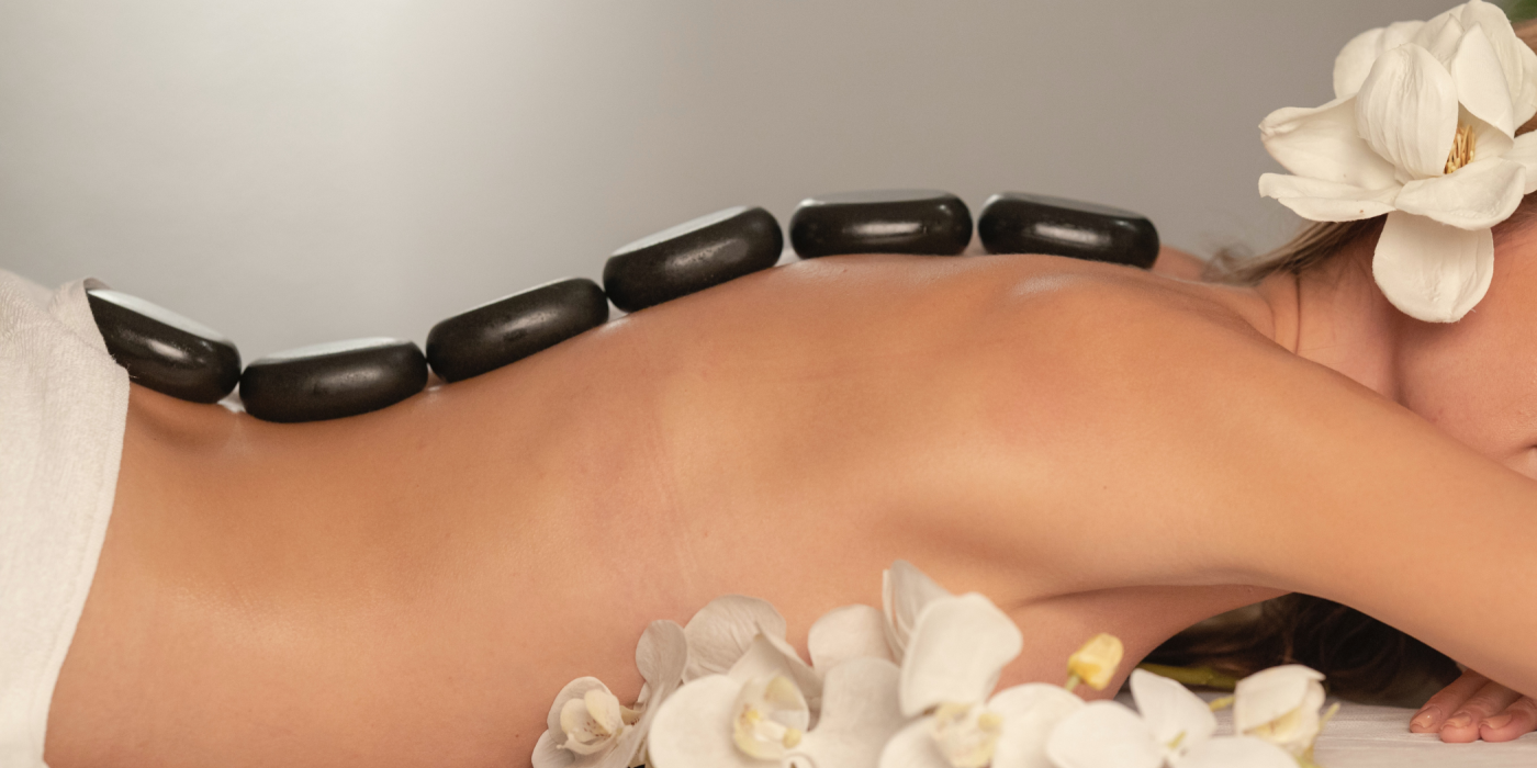 Experience the Warmth: Uncovering the Benefits and Techniques of Hot Stone Massage